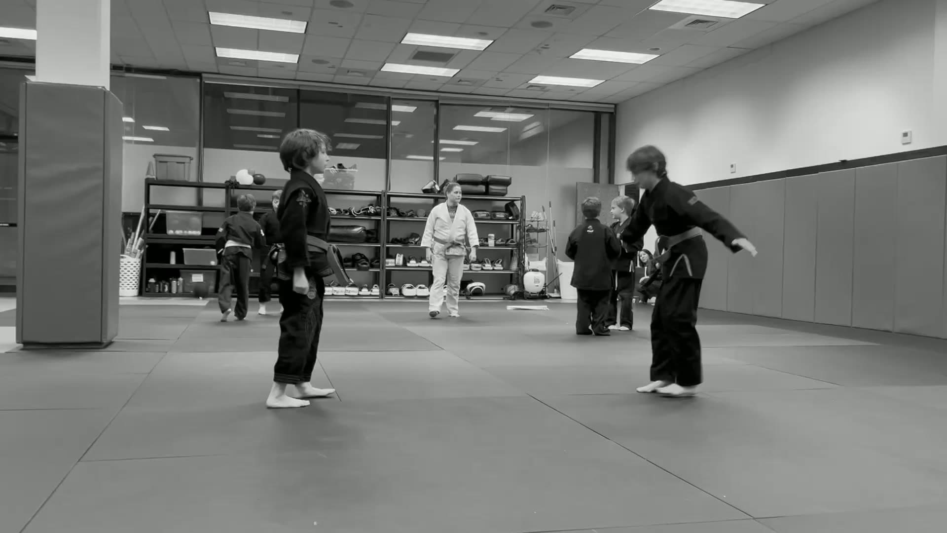 T-Town MMA/Checkmat Tacoma logo